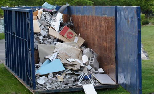 Truck and skip outside a residential property for hire in Wood Green