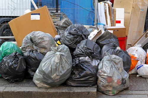 Skip collection process at a Wood Green construction site